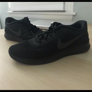 All black Nike Free sneakers